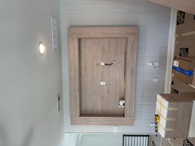 Built-in TV wall mount frame with paneled wall